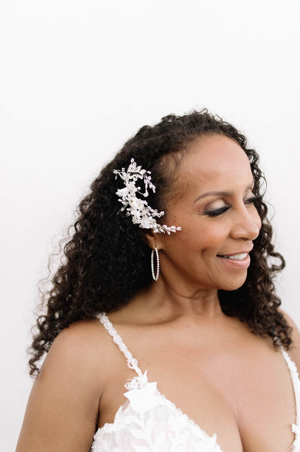 Angela smiling in her wedding dress